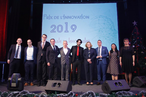 The team of Pulsio Print receiving the innovation award.